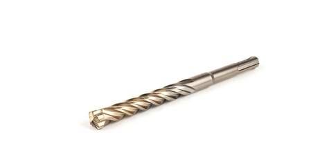 A drill bit for a hammer drill on a white background. The concept of drilling concrete.