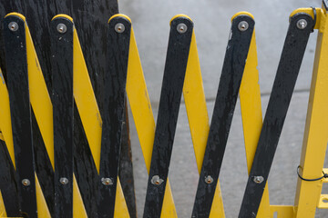 close up of an expandable metal barricade