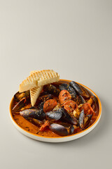 Vibrant Tom Yum Mussels with Grilled Bread A Culinary Delight in Rich Hues