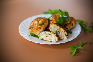 Juicy chicken cutlets in oil served for dinner