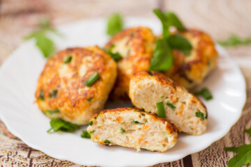 delicious chicken cutlets on a wooden table