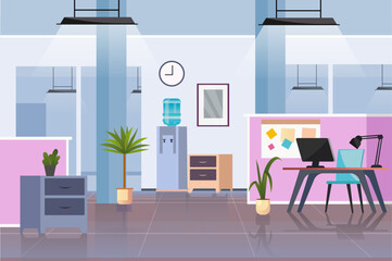 A colorful modern office space featuring plants, a water cooler, desks, and diverse decor. The environment is bright and conducive to creativity.