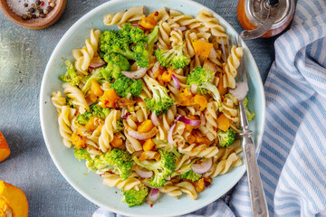 Pumpkin and broccoli vegan warm pasta salad