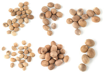 Nutmeg seeds on white background, set. Top view