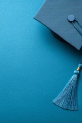 Graduation Cap on Blue Background Symbolizing Achievement and Education.