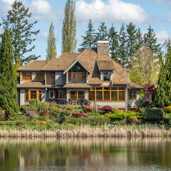 Luxury house with nice spring lake view and green landscape in Vancouver, Canada, North America....