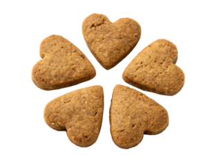 Heart-shaped natural brown dog biscuits, isolated PNG transparent background