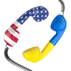 Ukraine USA communication, diplomacy, political dialogue, or negotiations between the two nations. Telephone receivers with United States and Ukrainian flags, 3D rendering isolated
