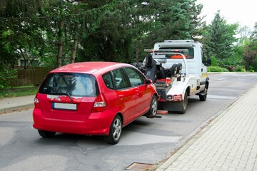 evacuation of a faulty vehicle by partial loading