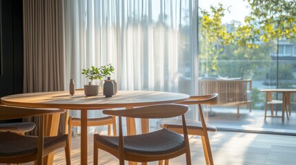 Fototapeta premium Stylish Nordic dining room with round oak table, sculpted chairs, and natural light flooding through sheer drapes