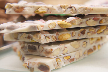 Sweet delicacy featuring nuts stacked on a plate