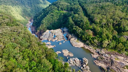 Barron Falls, Cairns, Queensland, Australia: Aerial Footage of Waterfalls, Rainforest, Skyrail Cableway, Scenic Lookout, Kuranda Train Station, and Lush Landscape in Barron Gorge National Park