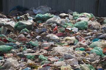 Trash piles accumulate in urban area