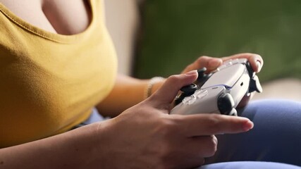 Woman playing video simulator game on console TV with joystick, light room - Powered by Adobe