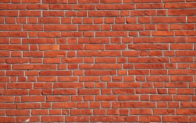 Red brick texture creating a sturdy wall, offering an ideal background with plenty of copy space for various design needs