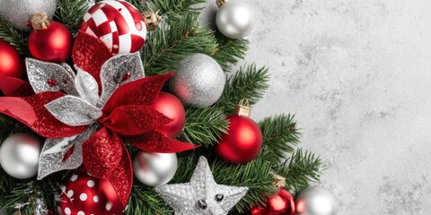 Christmas tree decorated with red and silver ornaments in a festive indoor setting.