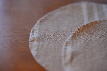 The coaster was made by hand.