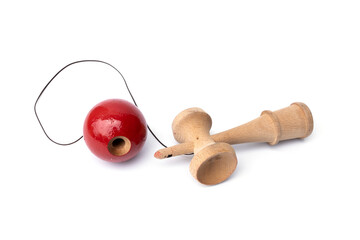 Vintage Old toys that have been played with there are traces damage of play. Cup and ball game Kendama traditional wooden japanese skill toy isolated on white background.