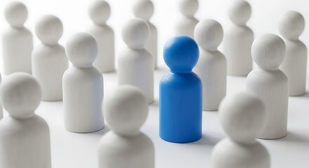 Single blue figurine amongst many white figurines.