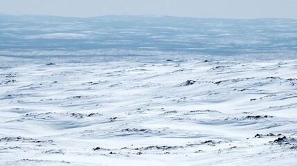Snowy mountain ridges stretching into horizon
