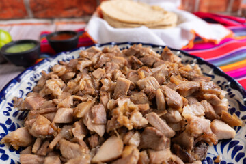 Pork carnitas, meat for preparing Mexican tacos