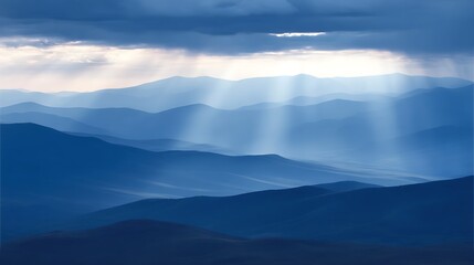 Rays of light pierce mountain range