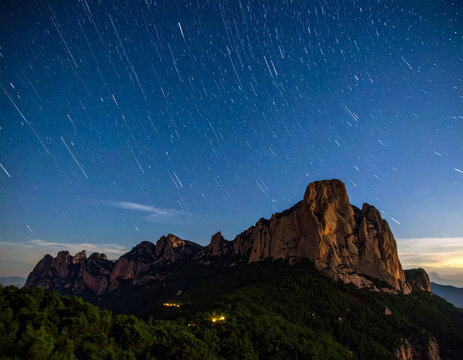 stars timelapse in the mountain background  - Powered by Adobe