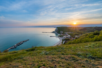 Peaceful Coastal Village Bay at Twilight, Lone Tree on Grassy Hill