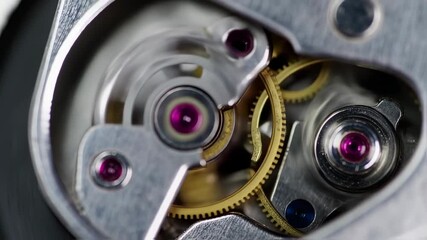 Detailed view of intricate watch mechanism, showcasing precision engineering and horological craftsmanship