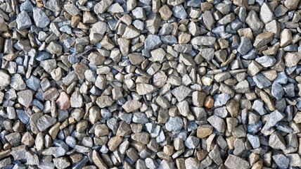 Gravel texture for construction or landscaping, in gray and brown tones