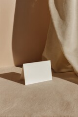 Minimalist Business Card Mockup with Premium Paper Texture and Soft Shadows on Neutral Fabric Background Professional Branding and Modern Networking Concept