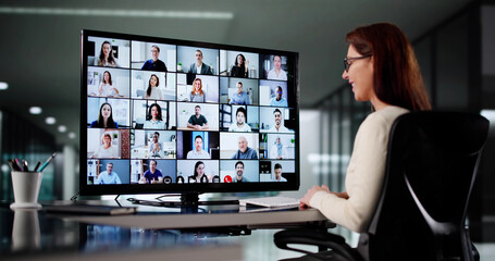 Young Female Executive Uses Video Conferencing
