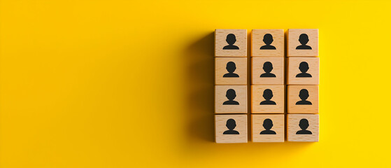 Wooden Blocks With Person Icons On Yellow Background