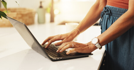 Home, typing and hands with laptop, kitchen and planning for blog on social media, app and...