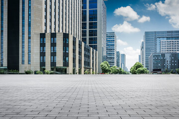 Urban Symphony: Modern Architecture and Expansive Cityscape Under a Bright Sky