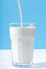 pouring milk into glass