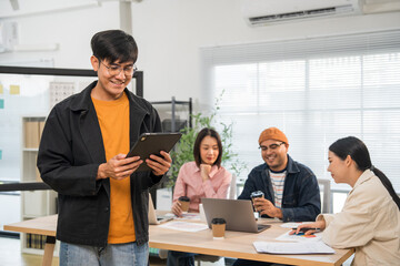 Asian business start up freelance people team analyzing statistics financial. Group Team of businesspeople man and woman Meeting Conference Discussion various topic Corporate Concept in office.