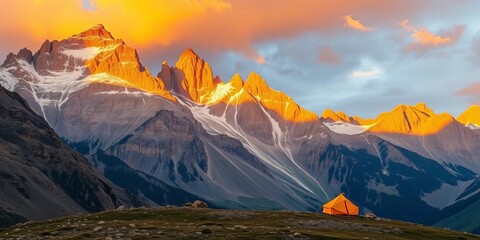 Sunrise paints alpine peaks gold, lone tent nestled below,  vista,  sky