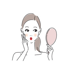 手鏡でお肌をチェックする可愛い女性
