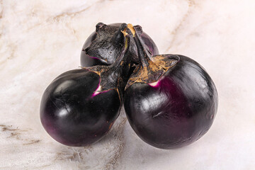 Raw violet and black eggplant