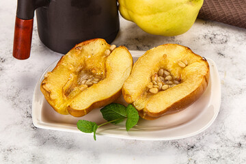 Baked quince with honey and cedar