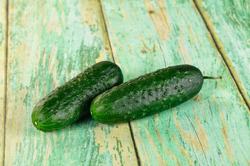 Ripe green raw two cucumbers