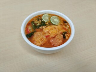 Seblak is a spicy culinary dish from Indonesia containing crackers  vegetables  and spices, High angle view 
