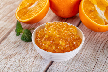 Sweet orange jam in the bowl