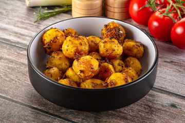 Baked small baby potato with herbs