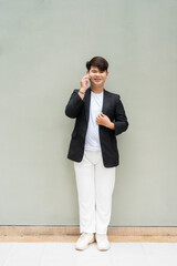 portrait of a handsome businessman talking on mobile phone