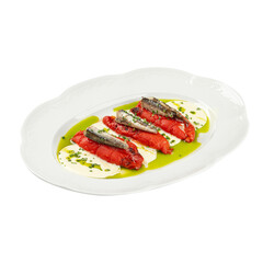 Portion of baked pepper appetizer with small fish