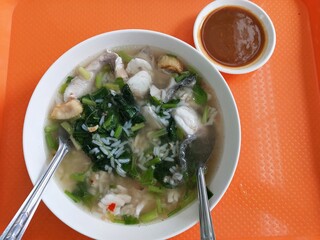 Thai Rice Soup with Fish and Spicy Seafood Sauce