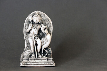 Kartikeya (Murugan) Hindu God Statue on Dark Background, Miniature Sculpture of Skanda, Indian...