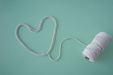 Twine heart shape with spool on mint